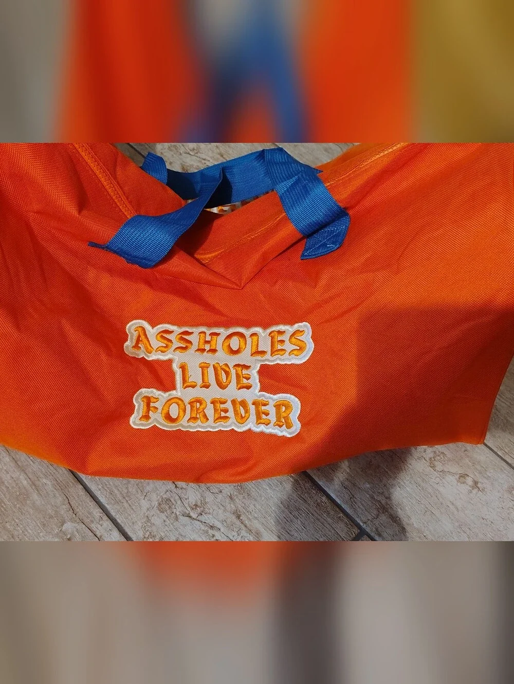 Emotional Baggage Orange Duffel Bag with Blue Handles